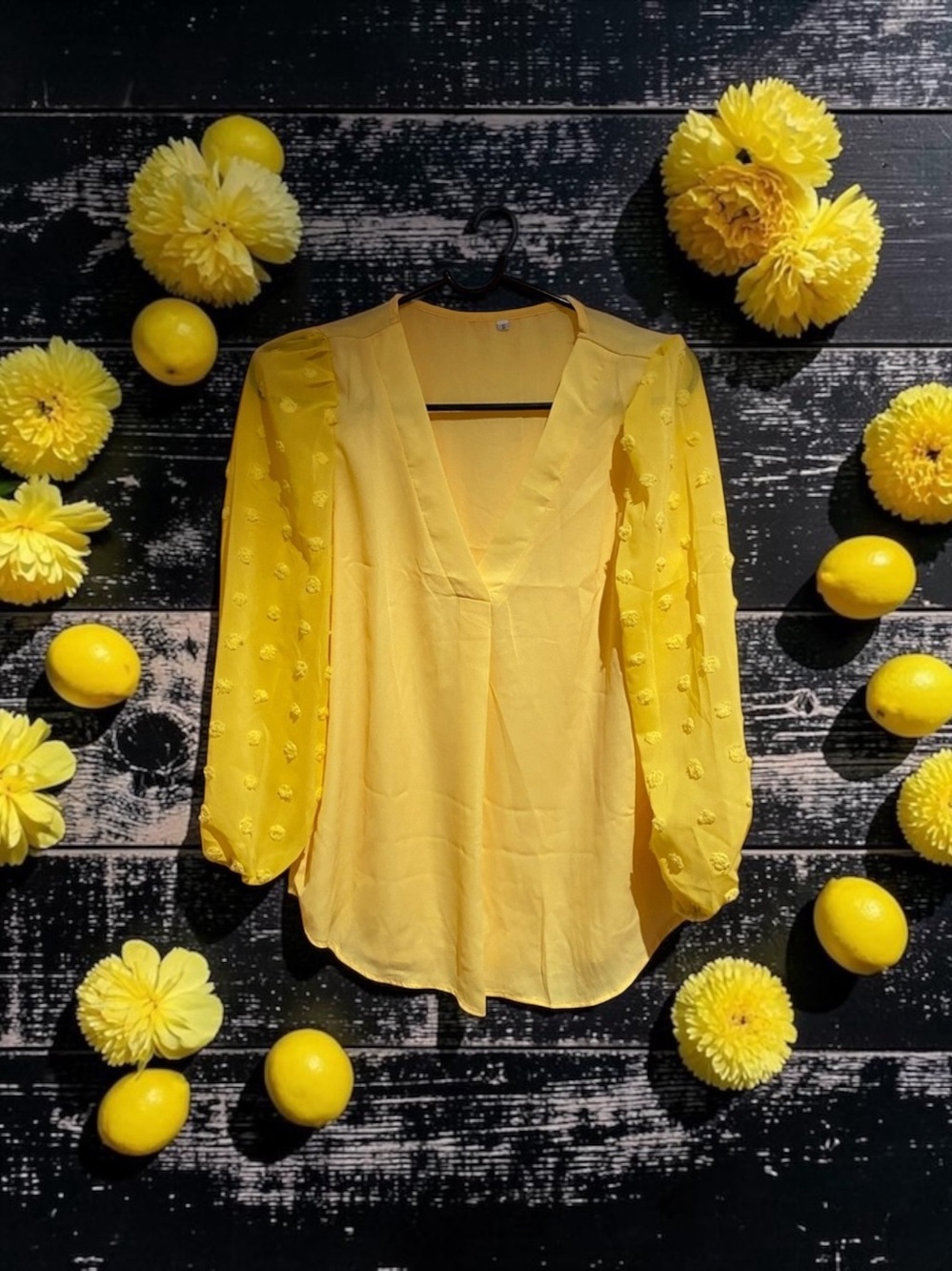 Adorable sheer pom-pom top